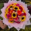 Bouquet buchon girasoles, gerberas y rosas.