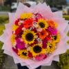 Bouquet buchon girasoles, gerberas y rosas.